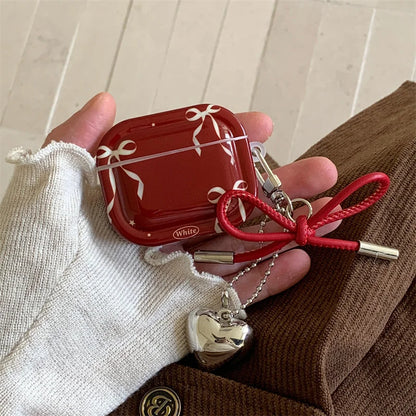 Cute bow AirPods Pro 2 silicone cover with dangling heart charm