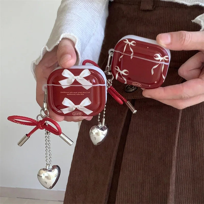Kawaii bow AirPods silicone case with love charm, front view