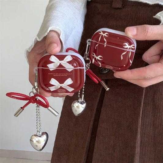 Kawaii bow AirPods silicone case with love charm, front view