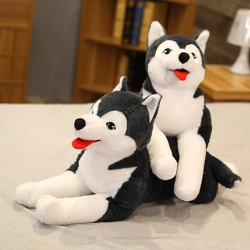 Giant husky plush toy propped upright showing body shape and plush texture