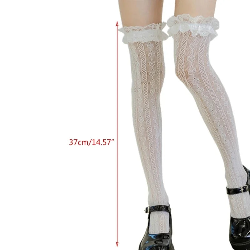 Close-up of woven heart motif in black fishnet thigh high stocking