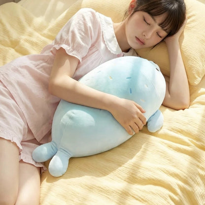Green kawaii stuffed seal plush 38cm flat-lay top-down view on neutral surface