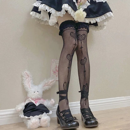 Japan style fishnet knee socks flat lay showing geometric pattern and lace cuff
