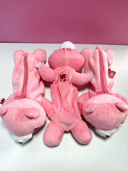 Kawaii bear zipper pouch flat lay, blush pink plush, full-width zipper visible