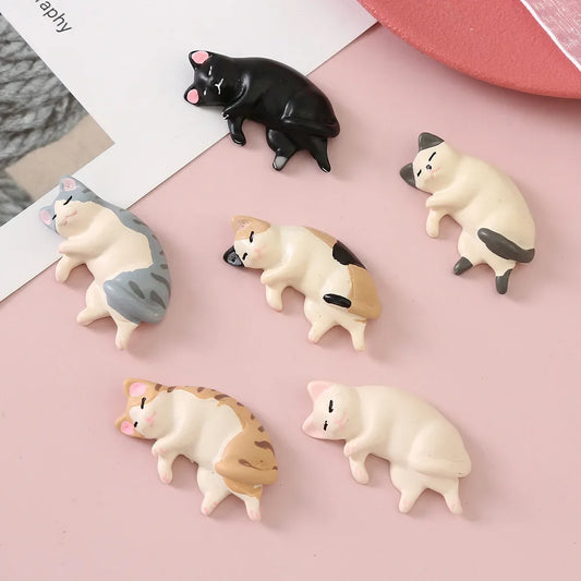Set of 6 kawaii resin sleeping cat miniature figures on white background