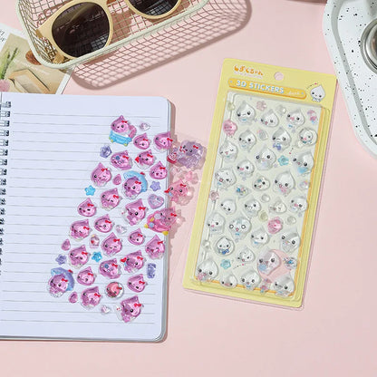 Side view of kawaii water droplet sticker showing 3D raised dome above flat paper surface