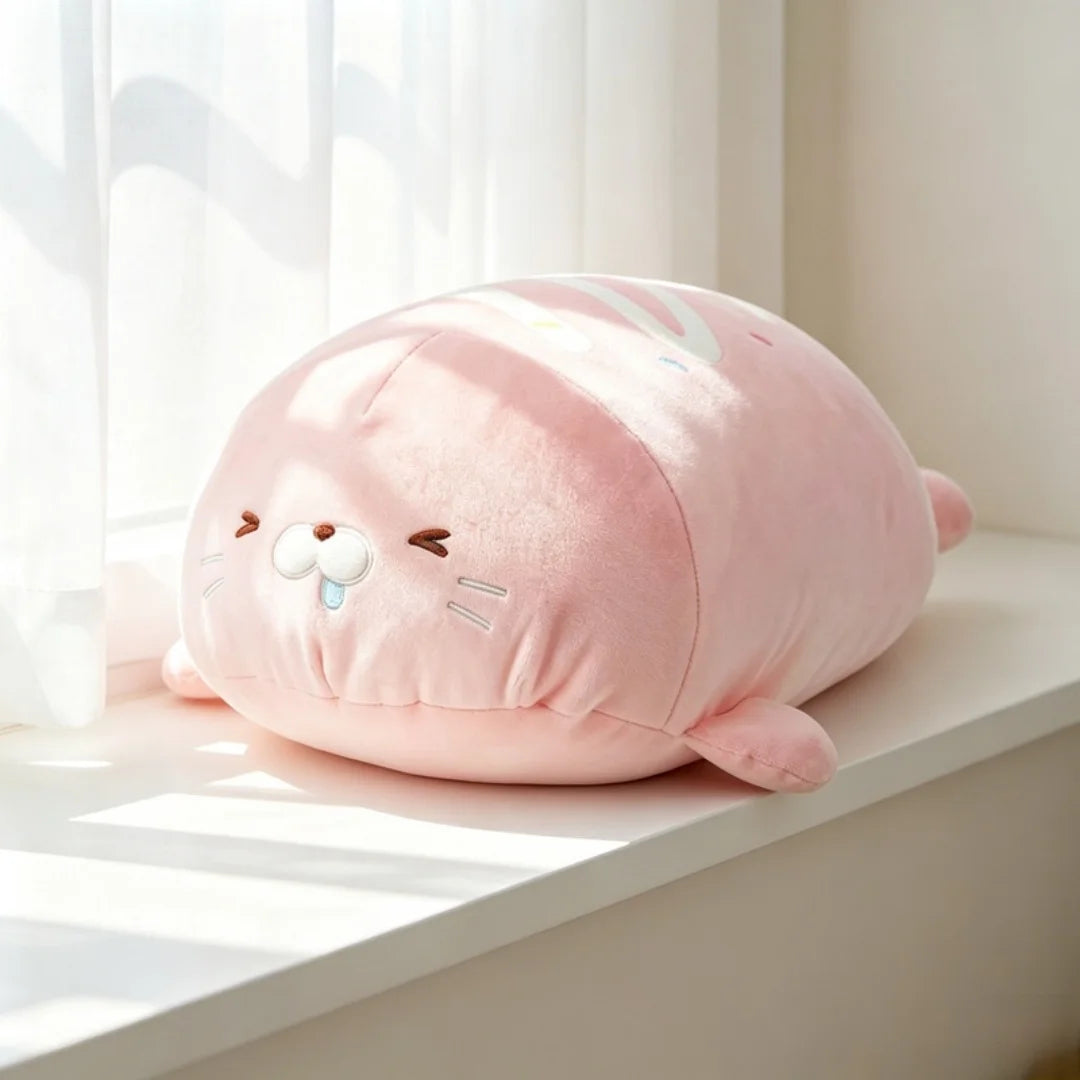 Pink kawaii seal plush toy 38cm styled on pastel kawaii bed setup