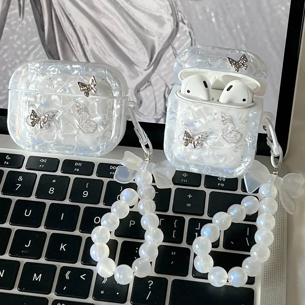 Kawaii AirPods Pro case with butterfly motif and structural pendant attachment point