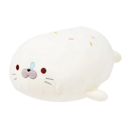 Close-up of kawaii seal plush embroidered face and short-pile polyester texture detail