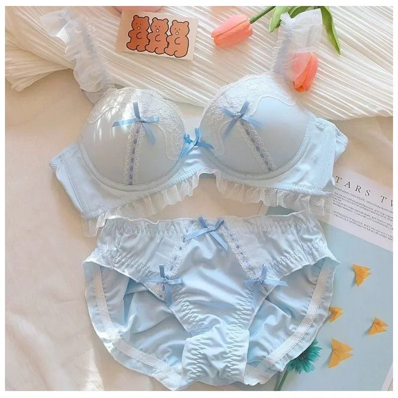 Kawaii pink lace bralette and matching briefs set on model, Harajuku style
