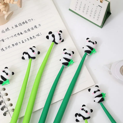Hand holding kawaii panda gel pen showing soft silicone grip detail