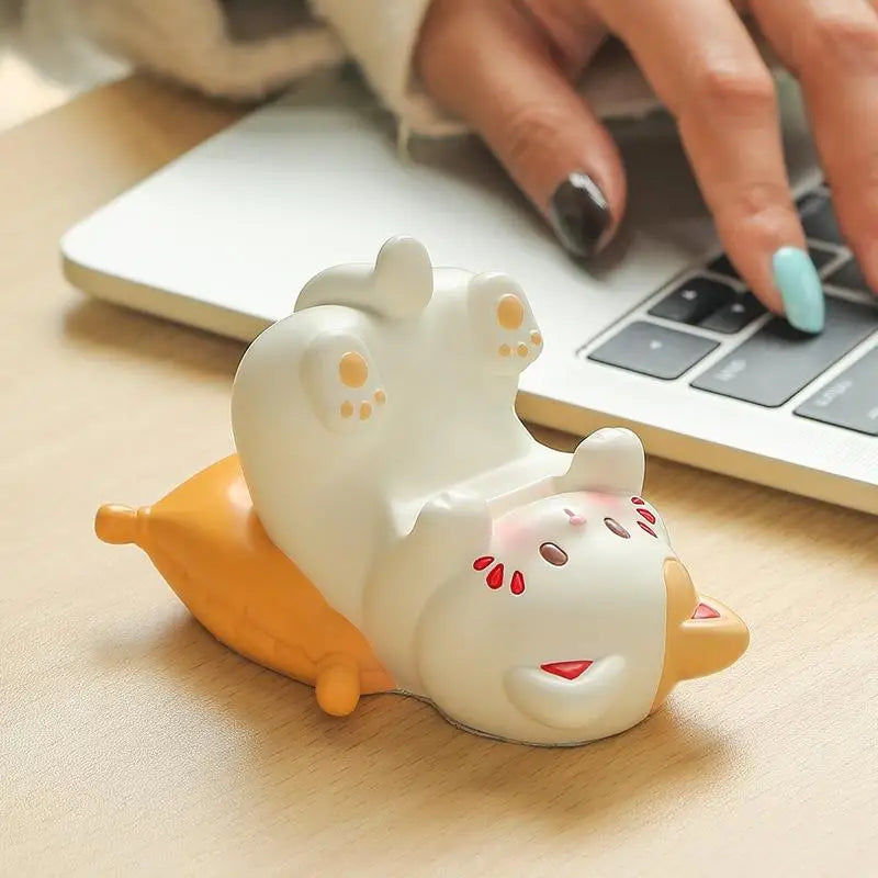 Resin kawaii cat glasses holder styled on home office desk with keyboard