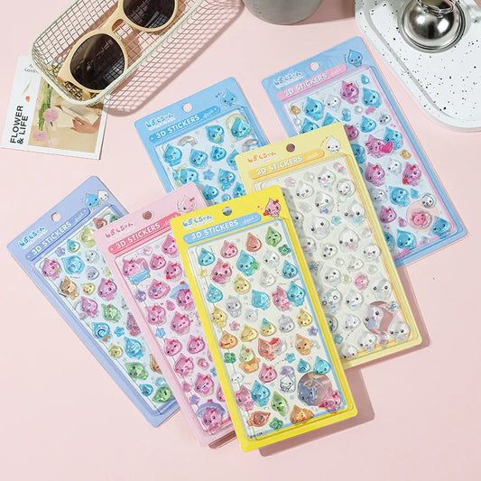 Six kawaii 3D crystal water droplet stickers on white background showing raised dome profile