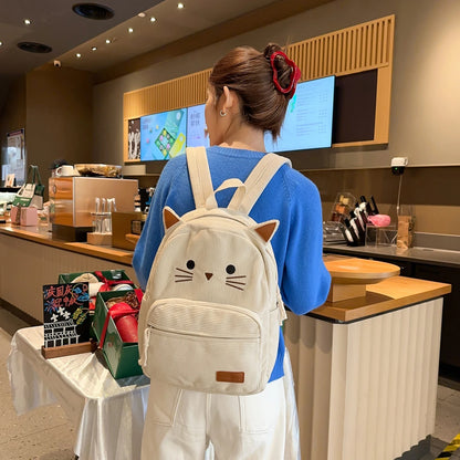Kawaii cat backpack for women in khaki, front view showing embroidered cat face
