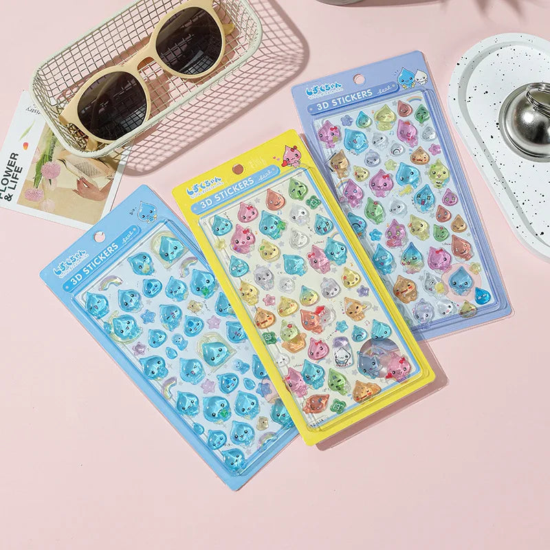 Kawaii 3D water droplet stickers applied to journal page in scrapbooking layout