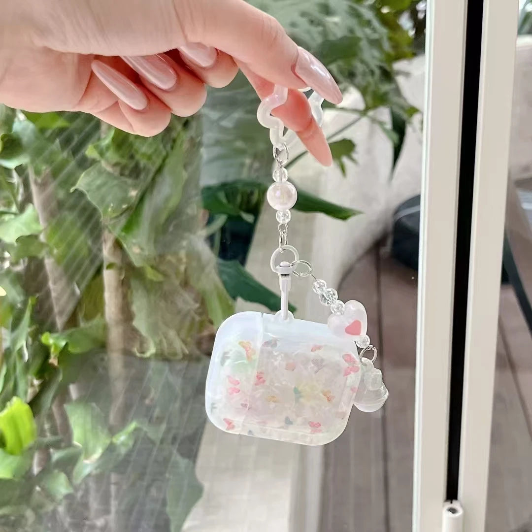 Cute AirPods Pro case with flower garden motif and wrist strap accessory