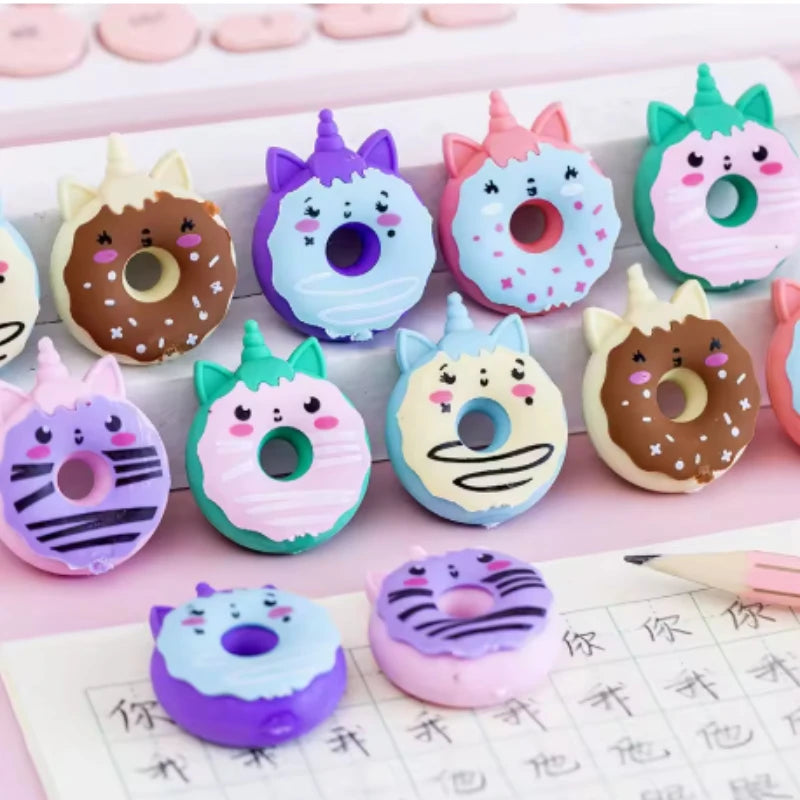 Kawaii unicorn and doughnut rubber erasers in pastel mix, 10-piece set flat lay