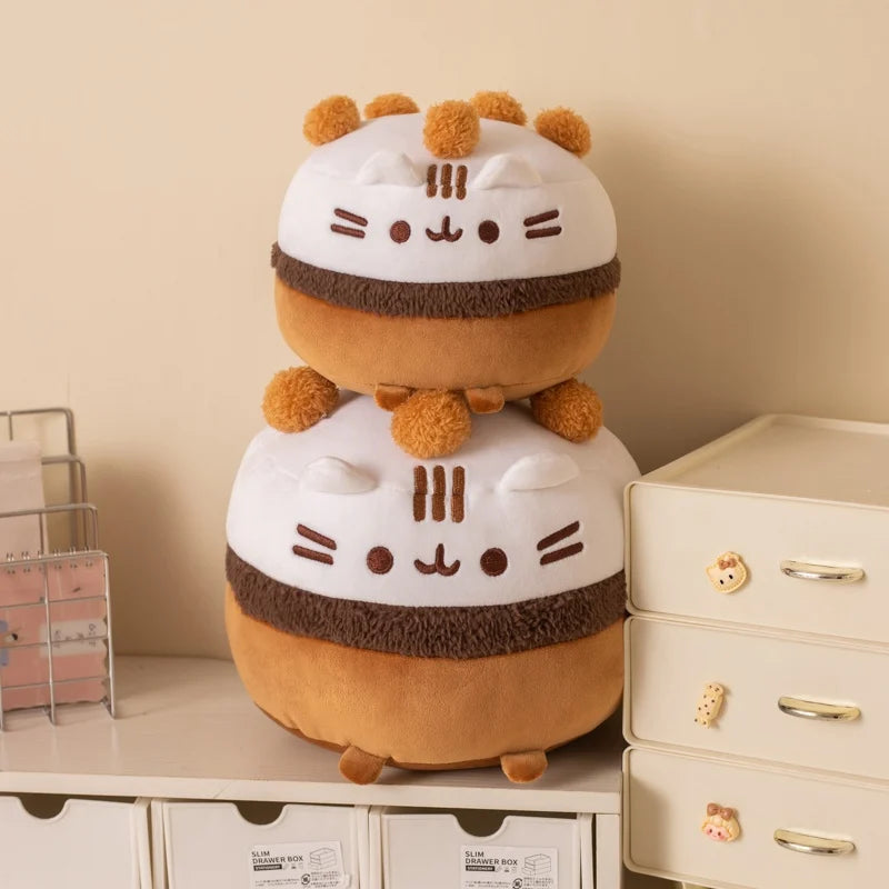 Kawaii fat cat stuffed animal pillow sitting upright on white surface