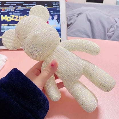 Kawaii rhinestone bear sculpture kit contents laid out including bear form glue and stones