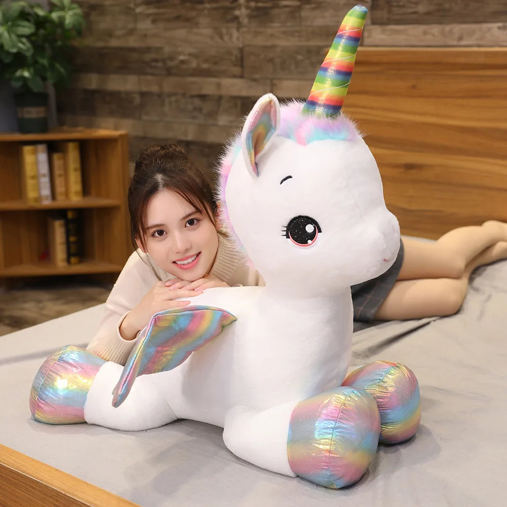 Rainbow mane detail on kawaii unicorn plush, stitched color sections visible