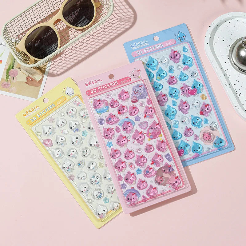 Set of 6 kawaii crystal droplet stickers on planner spread showing scale and placement