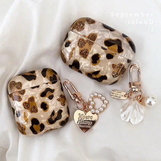 Kawaii leopard AirPods case with pearl accent on white background
