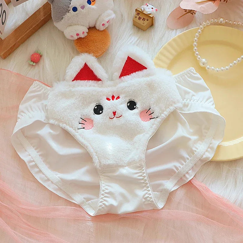 Kawaii plush briefs one size with cat cartoon embroidery, side angle