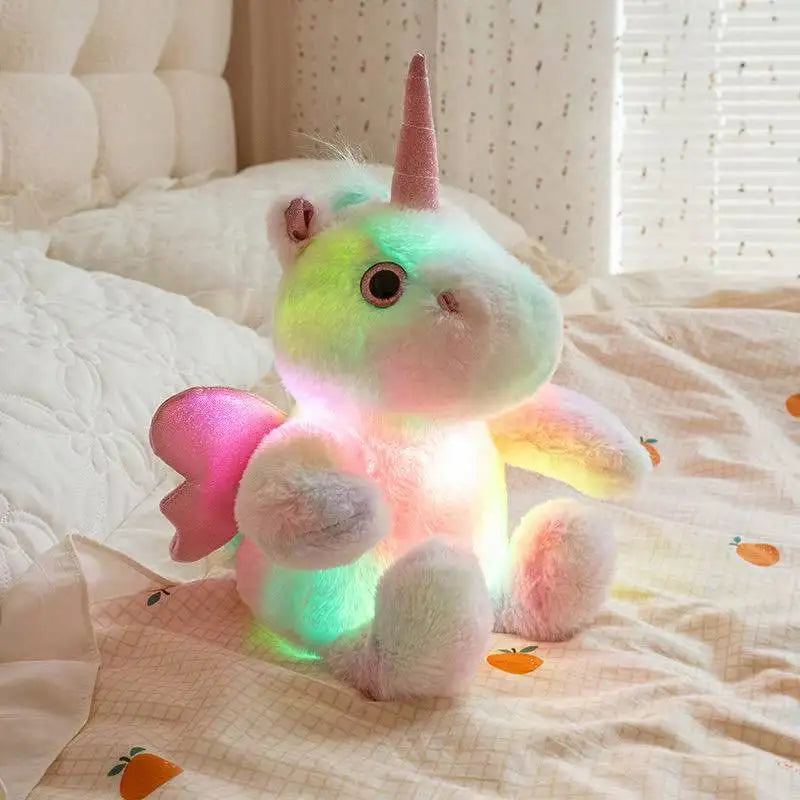 Unicorn kawaii plush toy glowing softly in low ambient light no batteries
