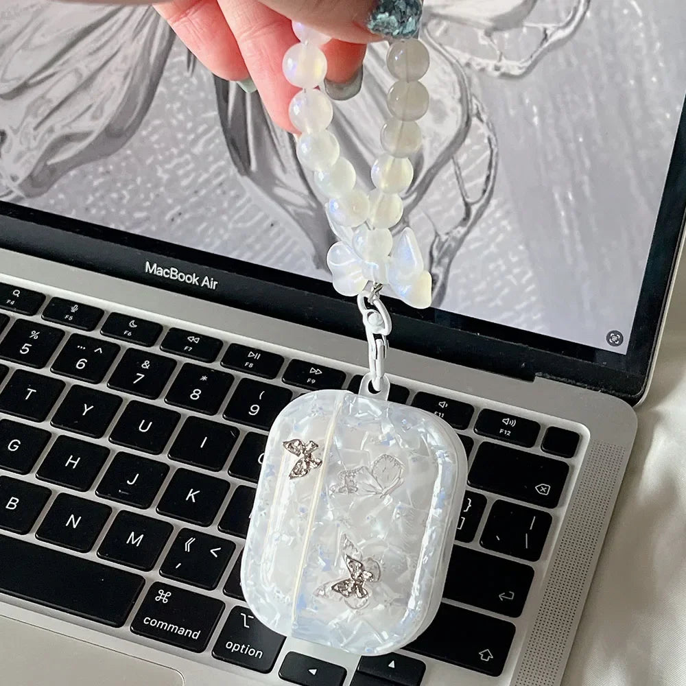 Butterfly AirPods case bracelet variant showing coordinated kawaii accessory set