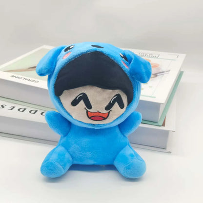 Side profile of kawaii stuffed doll showing hat stitching detail and plush body shape