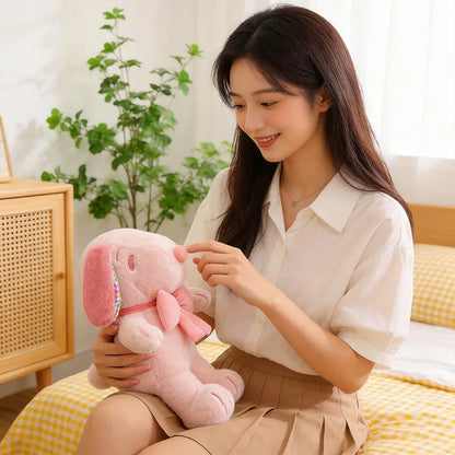 Pink Snoopy plushie 60cm sofa cushion size sitting on white couch