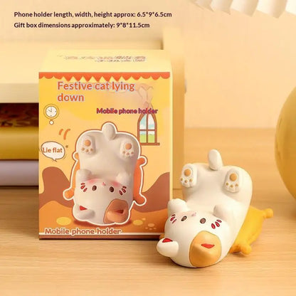 Kawaii cat resin phone holder front view showing slot and glazed finish
