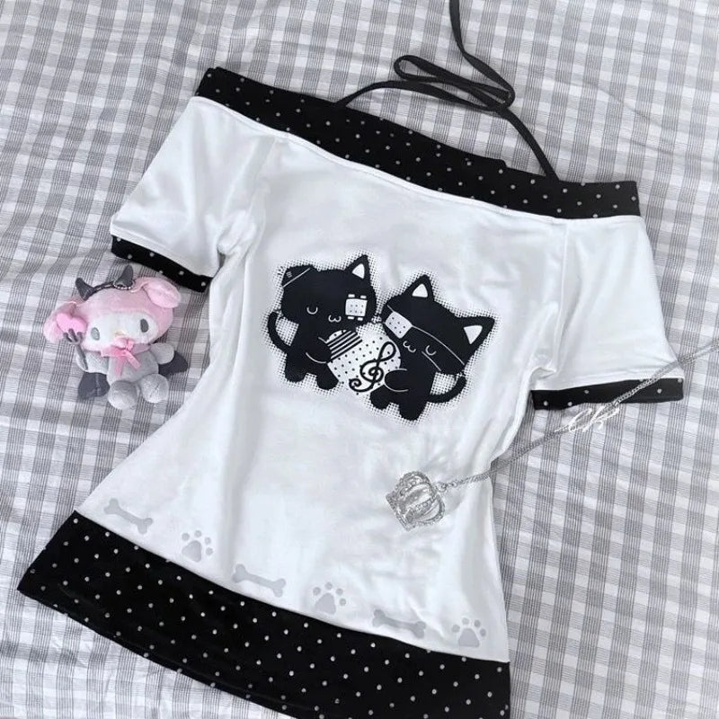 Japanese-style kawaii graphic tee flat lay showing print and polka dot detail