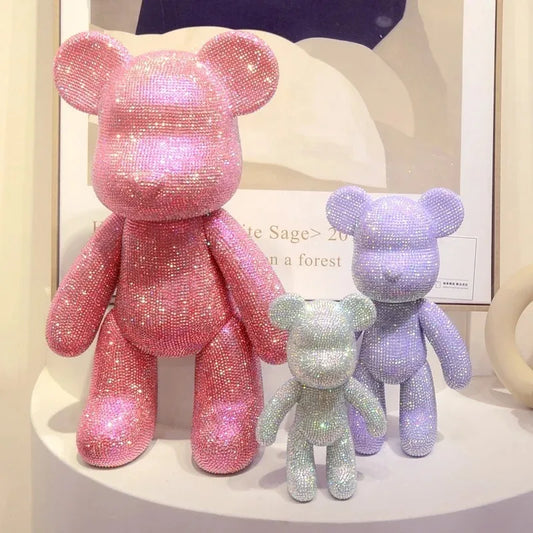 DIY crystal diamond bear figurine fully covered in dark purple rhinestones on white desk