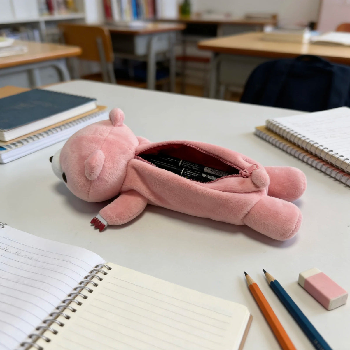 Pink bear plush pencil case side angle showing short-pile fabric texture