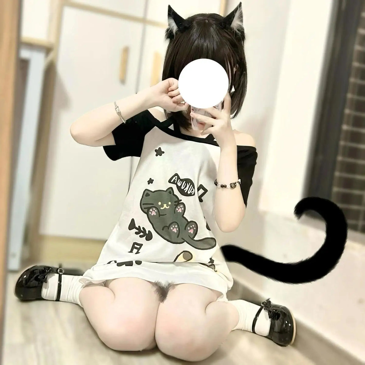 Japanese patchwork off-shoulder kawaii cat tee front view, Y2K graphic print