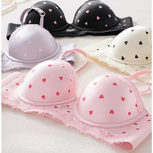 Kawaii heart lace bra and panty set in pink, front view, 3/4 cup push-up