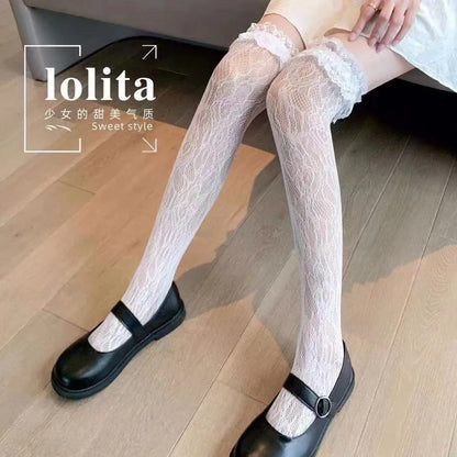 Japanese style heart striped fishnet stockings worn with Lolita coord