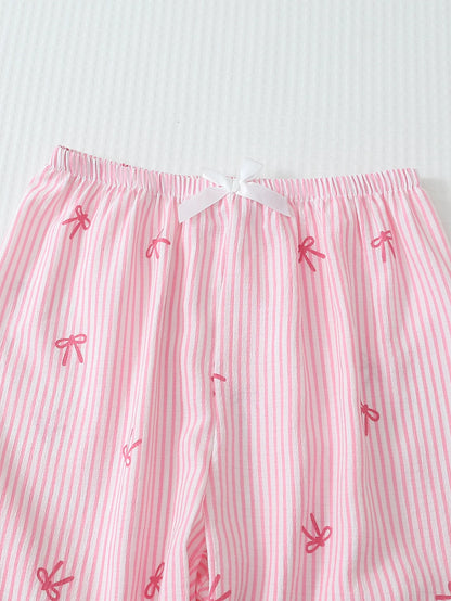 Pink bow pajama set back view long sleeve button-down women