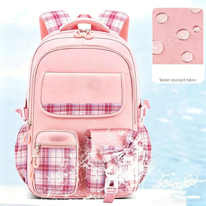 Kawaii plaid girls school backpack showing padded back panel and shoulder straps
