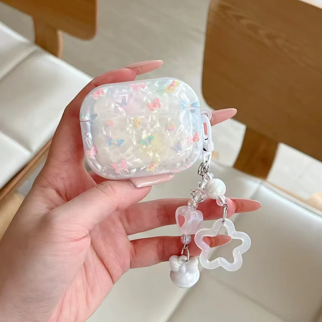Kawaii butterfly AirPods case showing snap-fit closure and charging port cutout