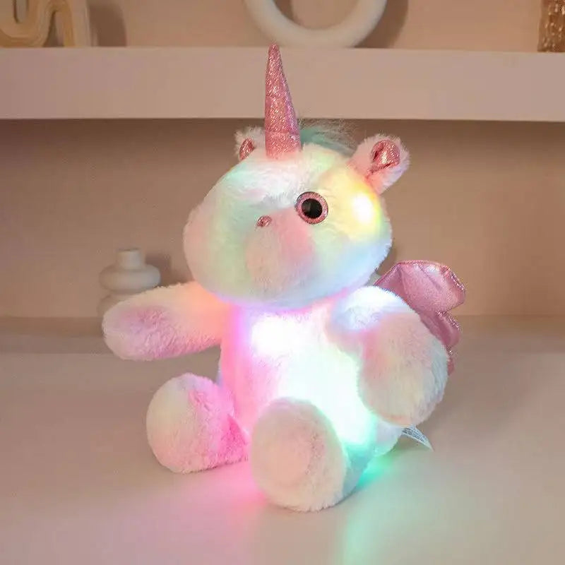 Kawaii unicorn anime plush toy displayed on bedroom shelf with other plushies