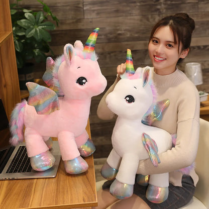 Kawaii unicorn plush pillow 50-60 cm size shown on bed as sleeping pillow