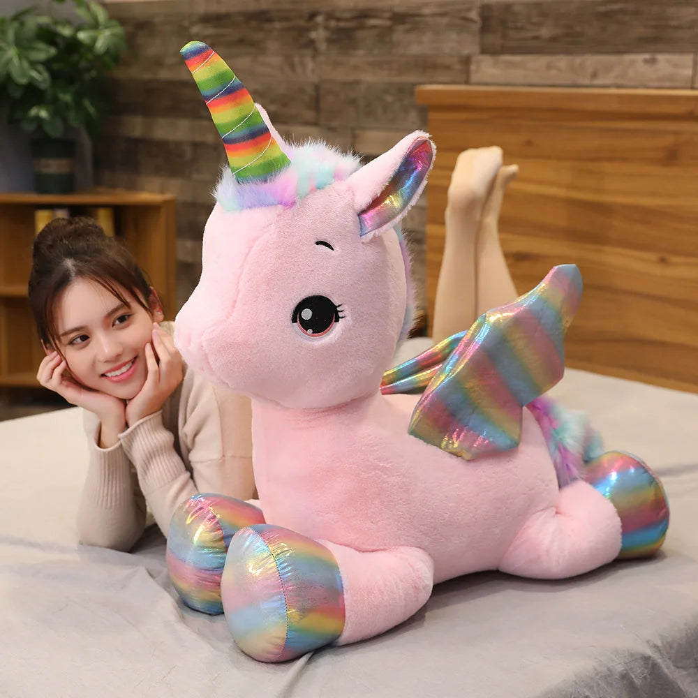 White kawaii unicorn plush pillow with stitched multicolor mane, front view
