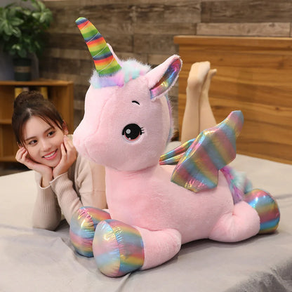White kawaii unicorn plush pillow with stitched multicolor mane, front view