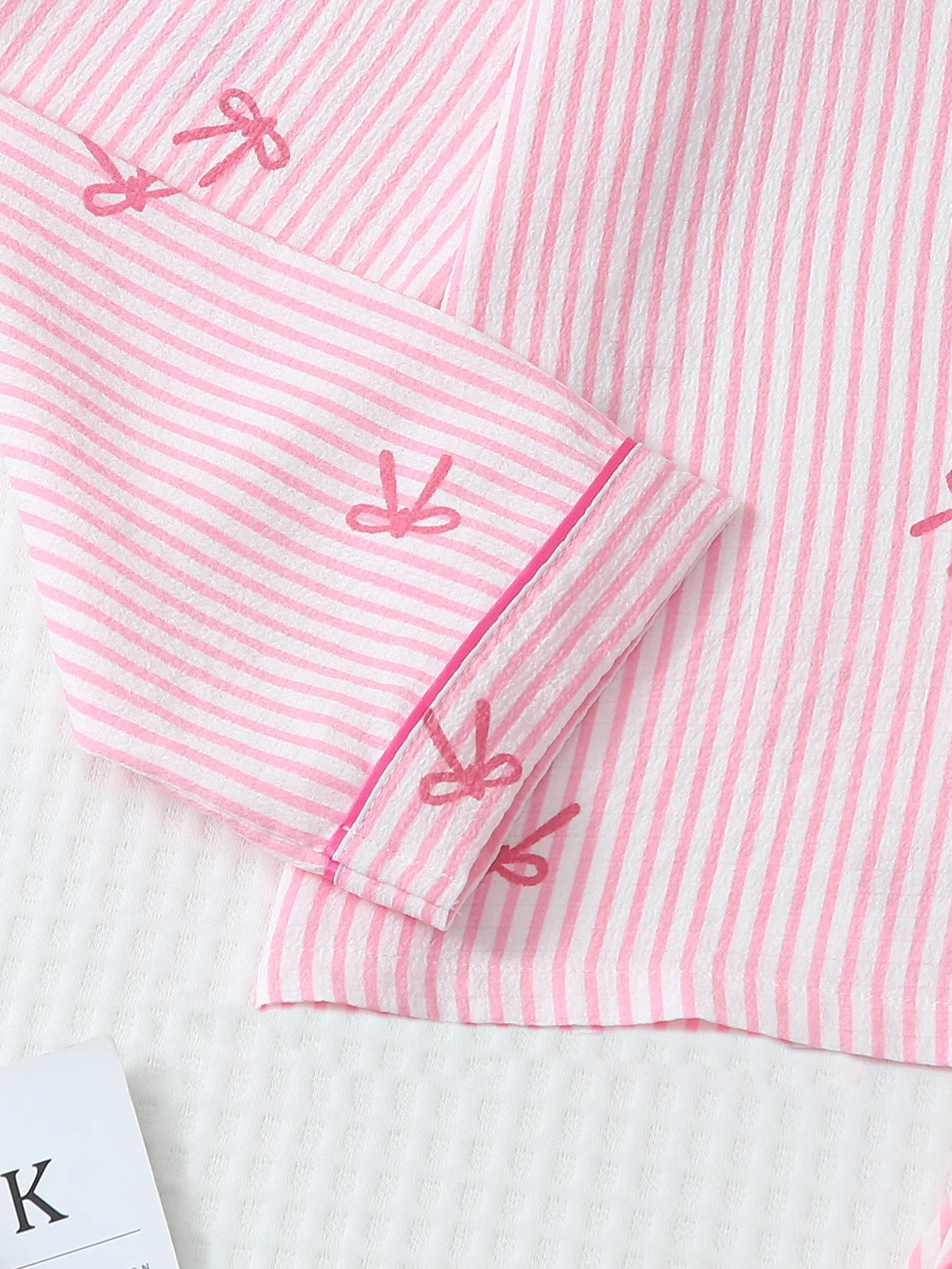 Kawaii winter pajama set long sleeve shirt and pants worn flat lay