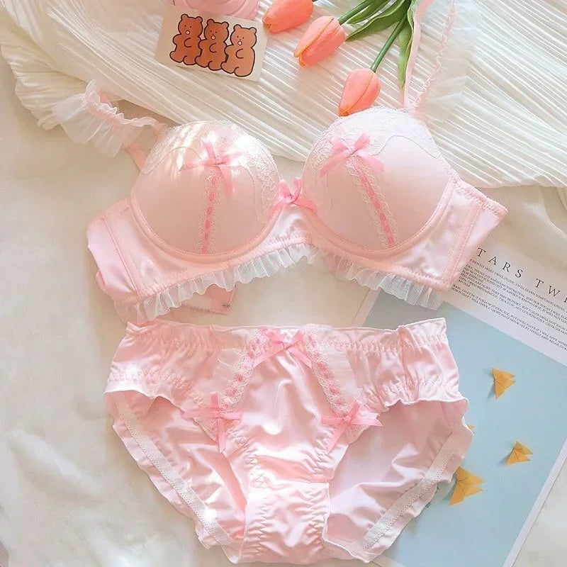 Close-up of pink lace bow detail on kawaii bralette center front