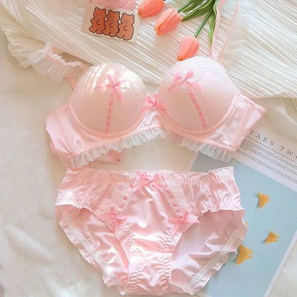 Close-up of pink lace bow detail on kawaii bralette center front